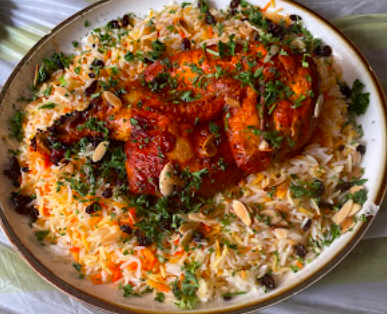Malooga signature dishes Chicken Mandi
Classic Hummus
Protein Bowl Shish Taouk